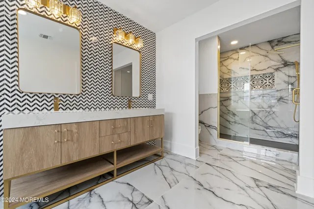 a view of a livingroom with wooden floor