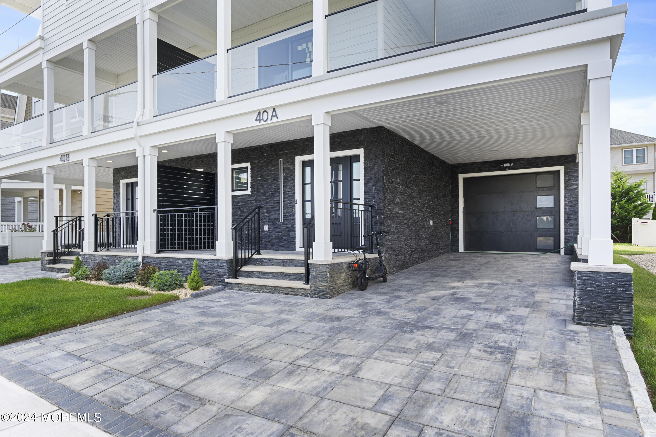40 Seaview Avenue, Unit A Long Branch, NJ 07740 - Photo 7 of 62 a view of a house with porch and a garden