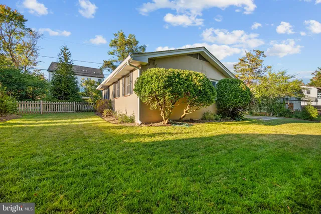 a view of a house with a park