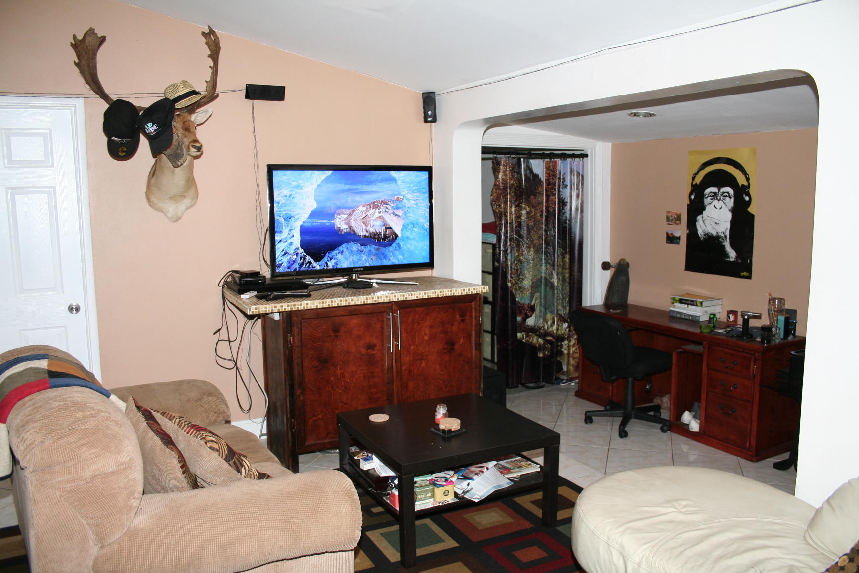 14925 Whatley Road Delray Beach, FL 33445 - Photo 5 of 8 a living room with furniture and a flat screen tv