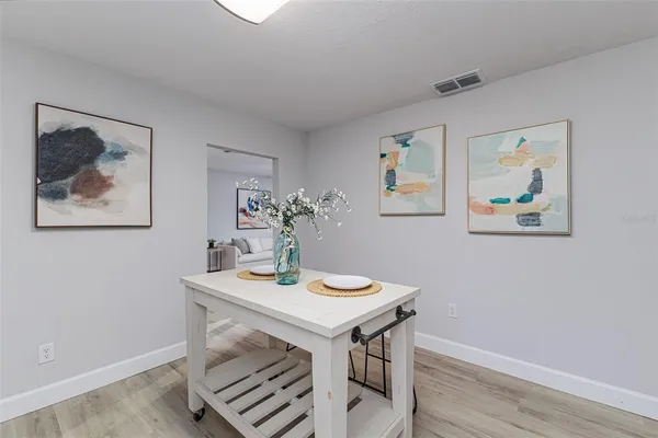 a view of a workspace with furniture