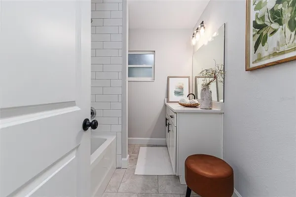 a bathroom with a sink and bathtub