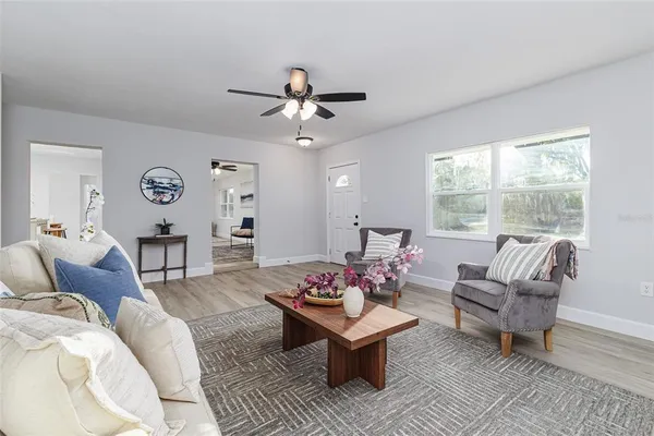 a living room with furniture and window