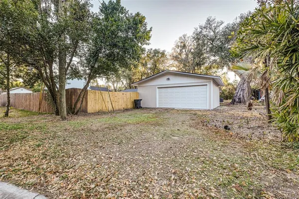 a house with trees in front of it