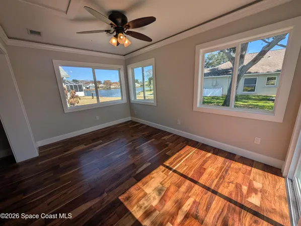 a view of an empty room and window