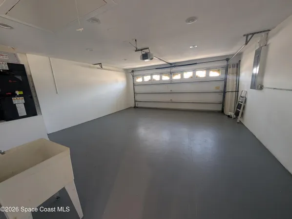 a view of empty room with windows
