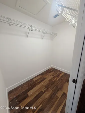 a view of small space with racks on the wall