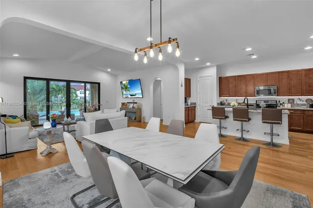 a view of a dining room with furniture window and outside view