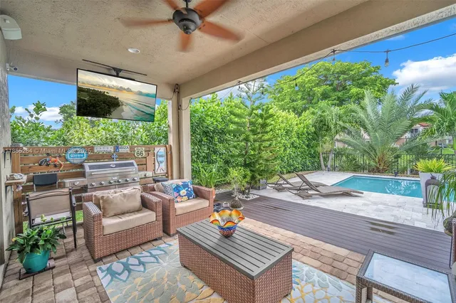 a outdoor living space with furniture and garden view