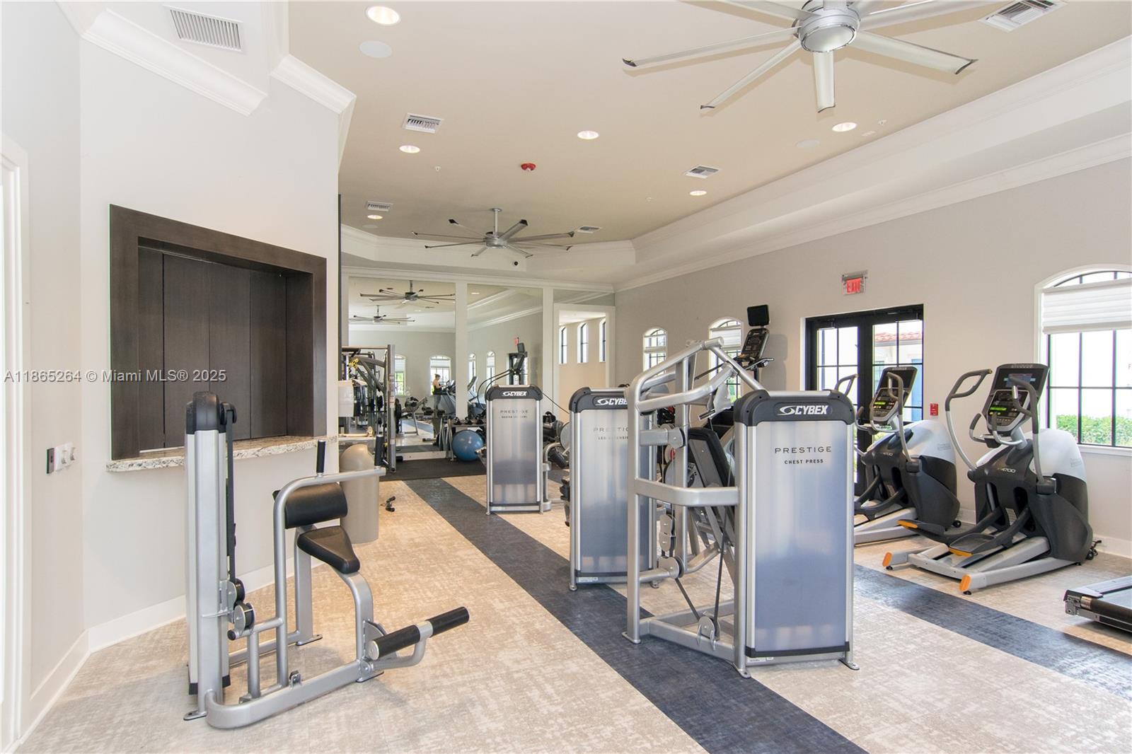 1281 Southwest 113th Way, Unit 1281 Pembroke Pines, FL 33025 - Photo 36 of 38 a view of a room with gym equipment