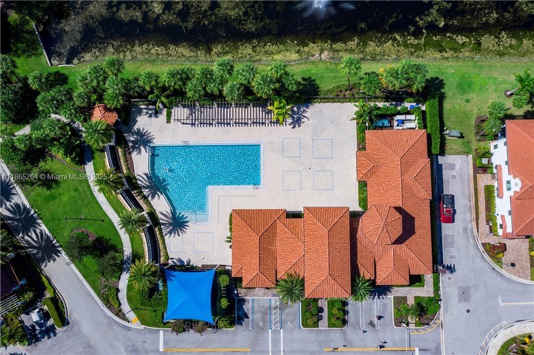 1281 Southwest 113th Way, Unit 1281 Pembroke Pines, FL 33025 - Photo 38 of 38 an aerial view of a house with outdoor space and a lake view