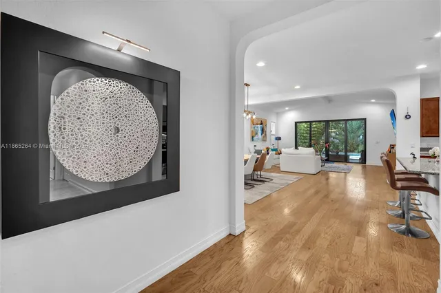 a view of a living room and dining room