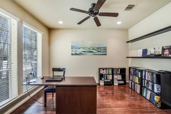 a en suite bathroom with double sink and a mirror
