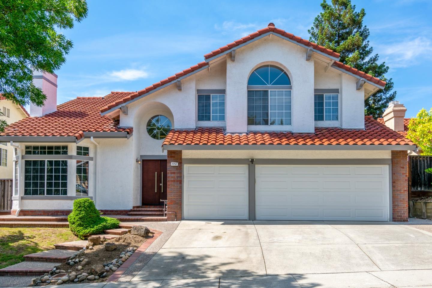 a view of a house with a garage