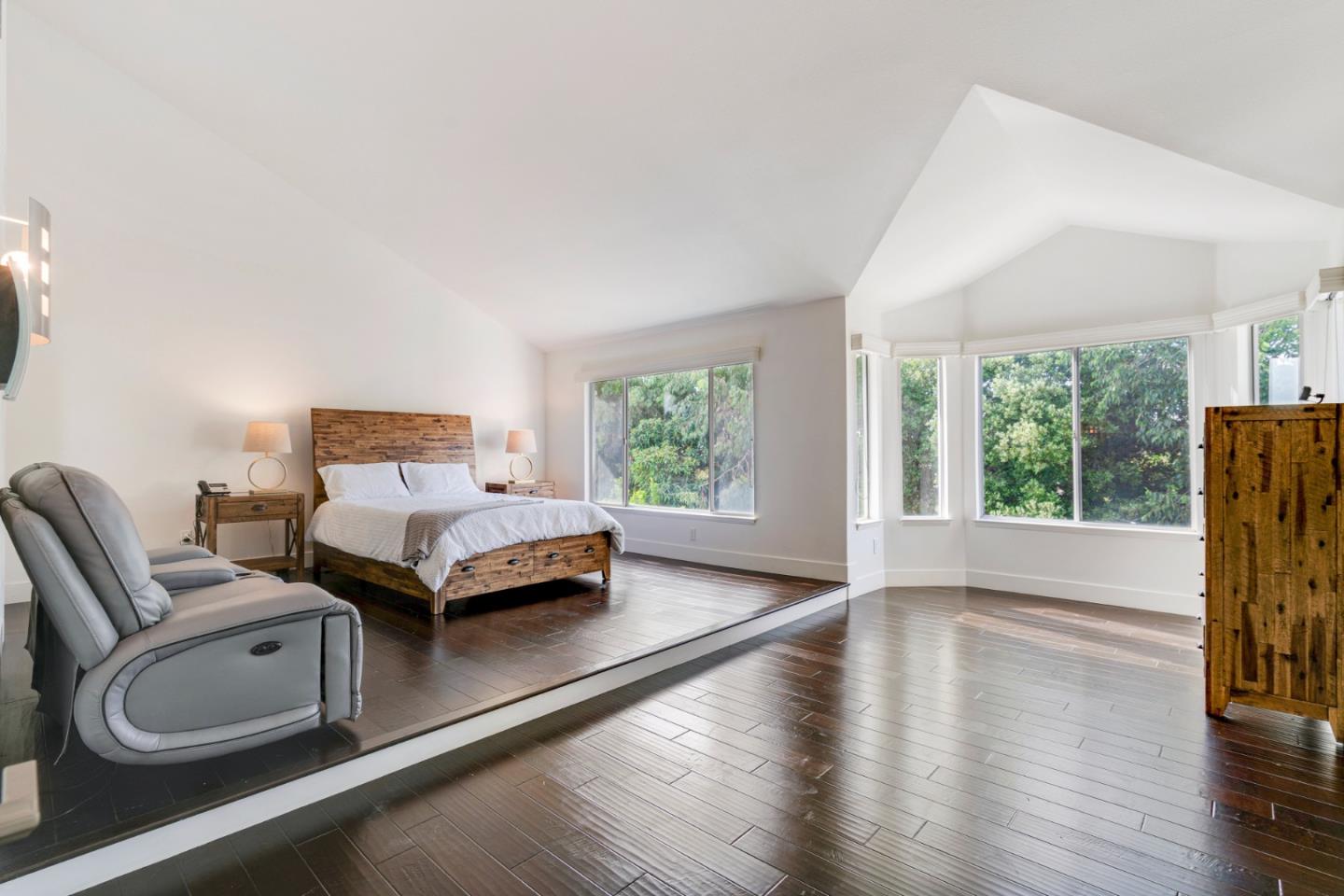 2257 Glenview Drive Milpitas, CA 95035 - Photo 17 of 28 a bedroom with a bed and wooden floor