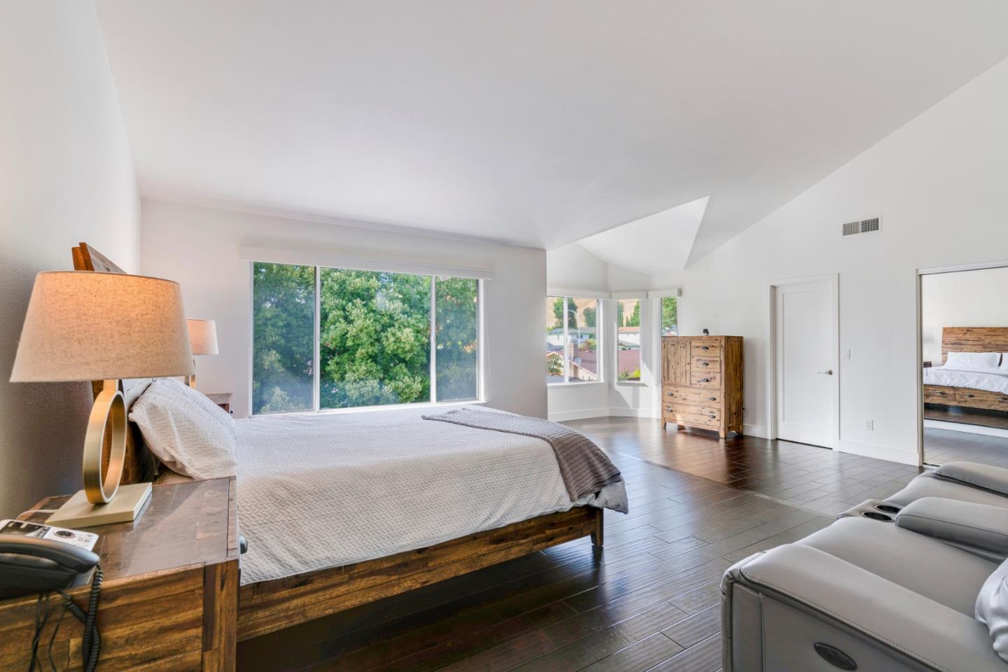 2257 Glenview Drive Milpitas, CA 95035 - Photo 18 of 28 a bedroom with a bed and wooden floor