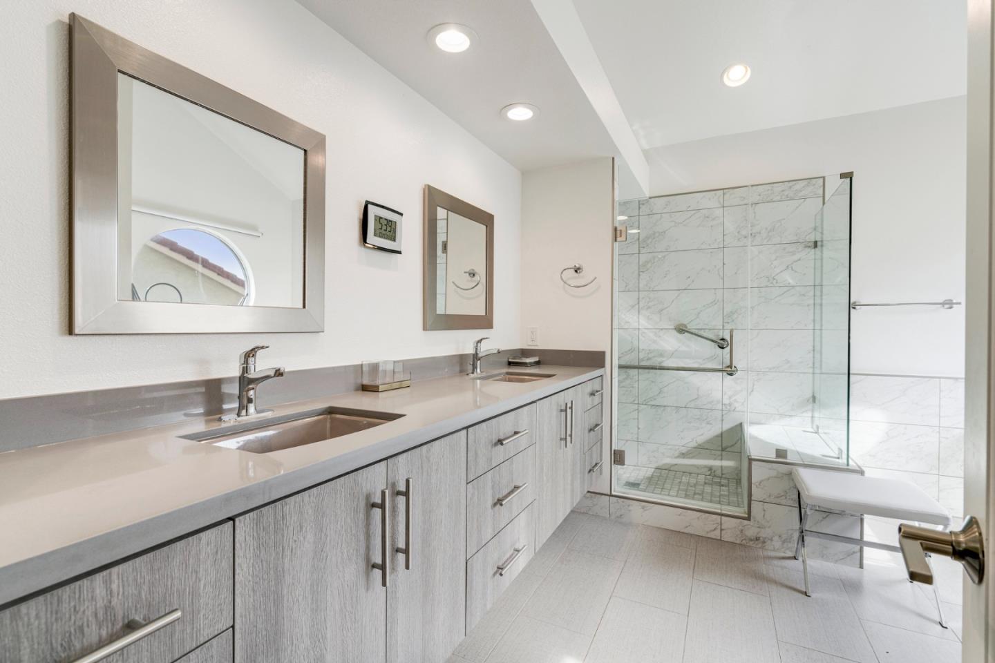 2257 Glenview Drive Milpitas, CA 95035 - Photo 19 of 28 a bathroom with a sink a vanity and a large mirror