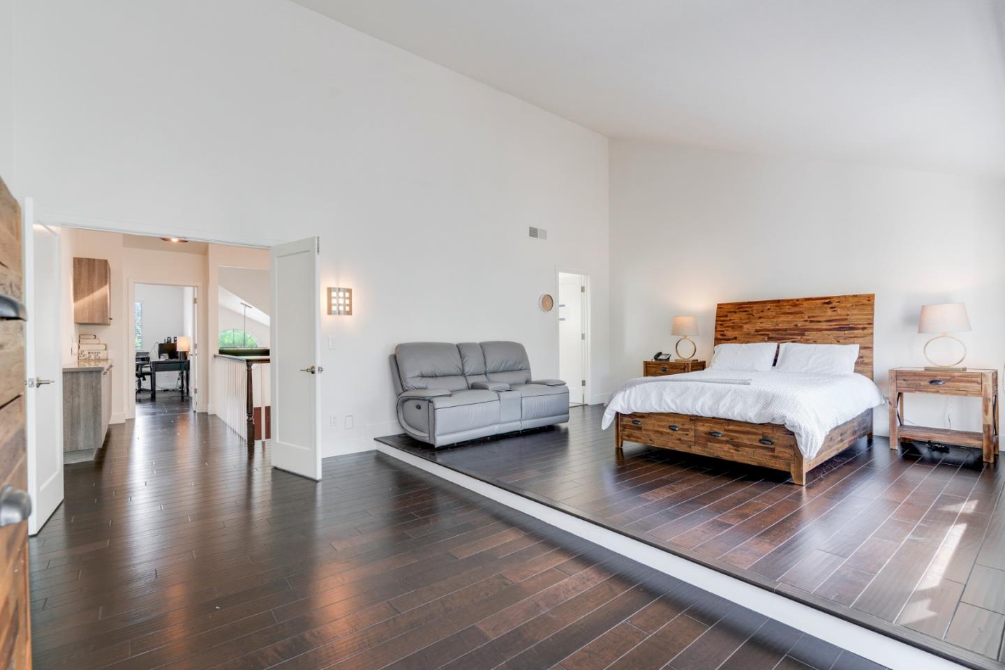 2257 Glenview Drive Milpitas, CA 95035 - Photo 20 of 28 a bedroom with a bed and wooden floor