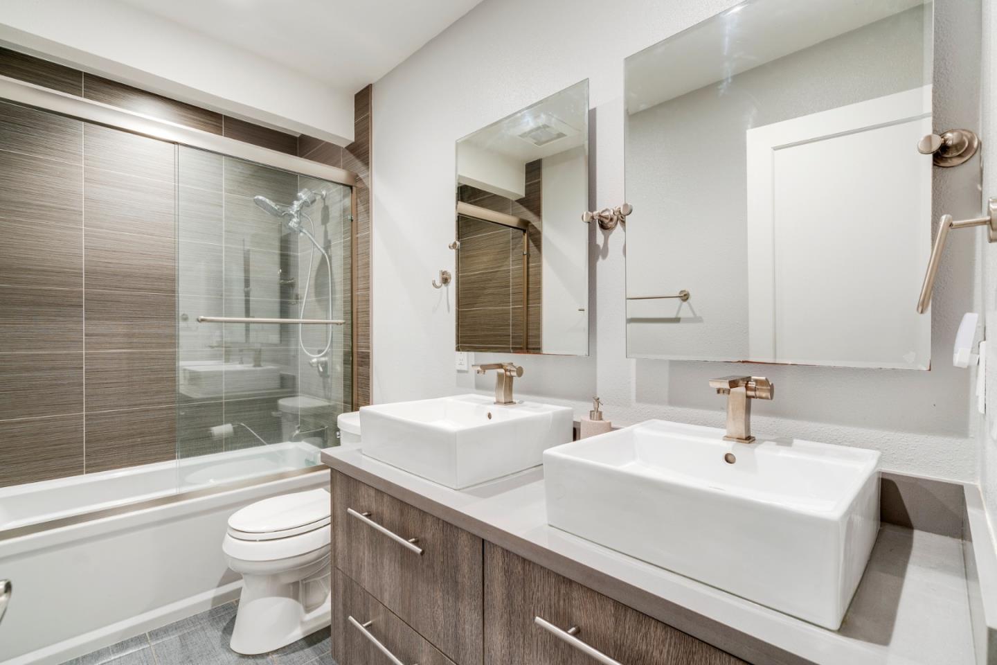 2257 Glenview Drive Milpitas, CA 95035 - Photo 26 of 28 a bathroom with a sink a toilet and shower