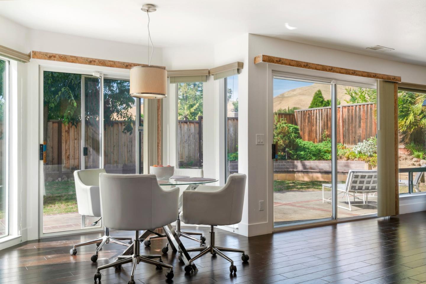 2257 Glenview Drive Milpitas, CA 95035 - Photo 6 of 28 a view of a dining room with furniture window and wooden floor