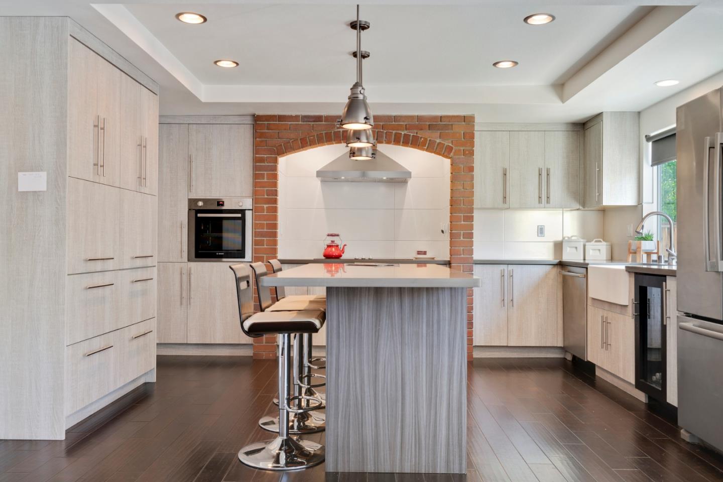 2257 Glenview Drive Milpitas, CA 95035 - Photo 8 of 28 a kitchen with white cabinets and stainless steel appliances
