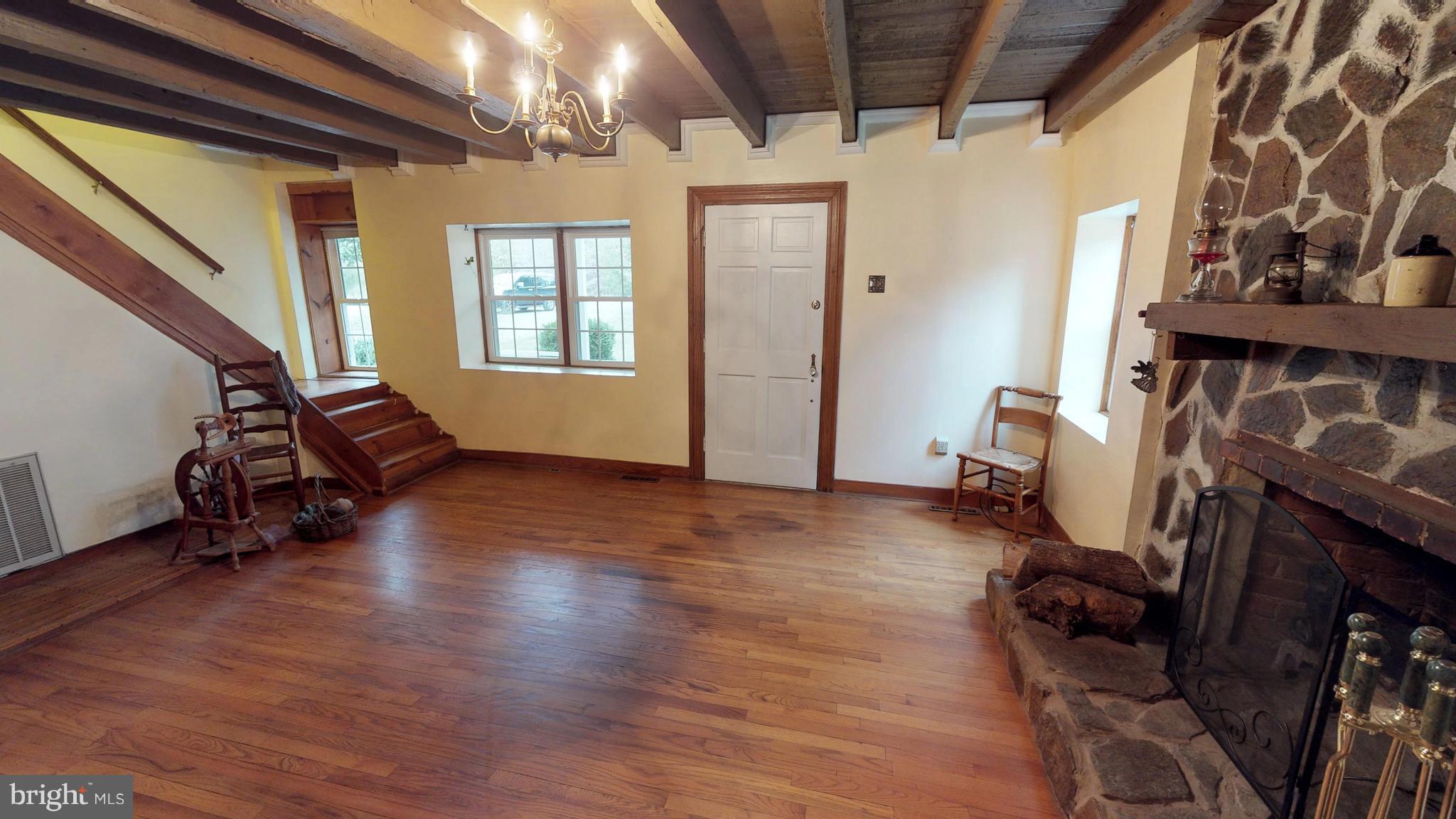 527 Hawkins Farm Road Bumpass, VA 23024 - Photo 14 of 30 a view of an entryway with wooden floor and a window
