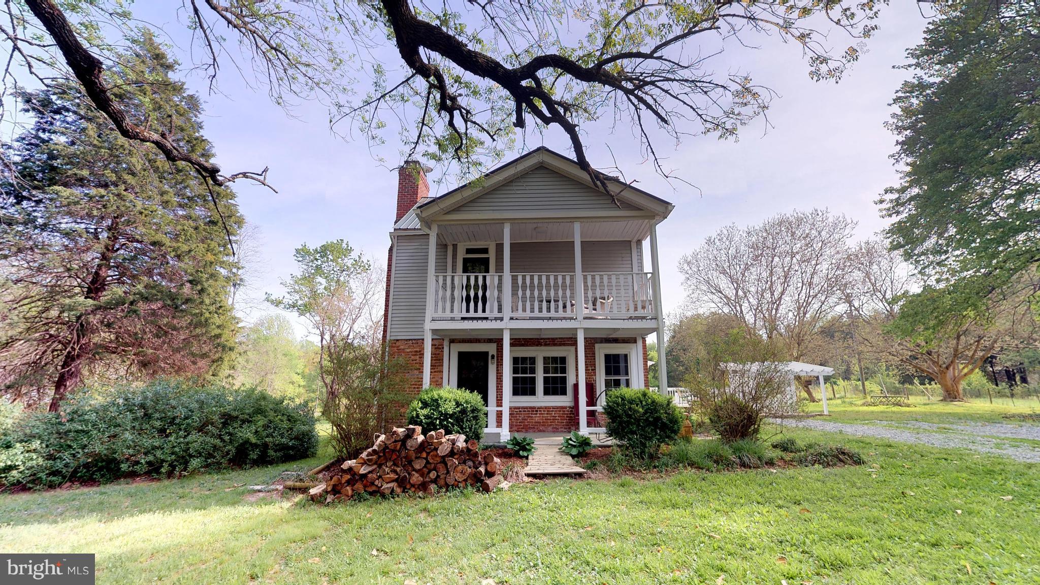 527 Hawkins Farm Road Bumpass, VA 23024 - Photo 2 of 30 a front view of house with yard and green space
