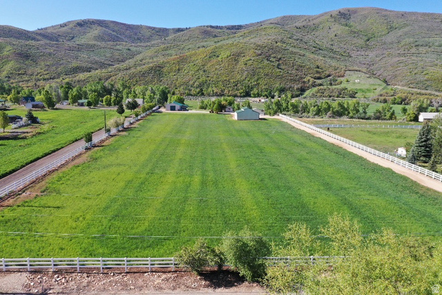 1454 East Little Sweden Road Heber City, UT 84032 - Photo 6 of 35 Overview of rural landscape with a mountainous background and agricultural land
