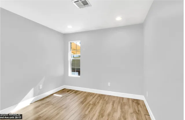 a view of an empty room and window
