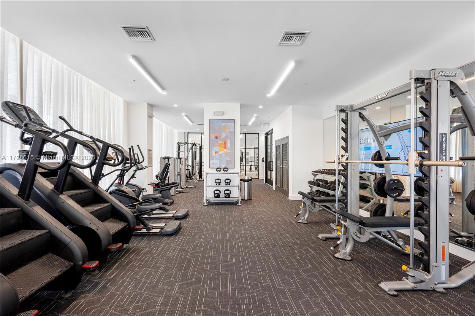 208 North Federal Highway, Unit 309 Pompano Beach, FL 33062 - Photo 16 of 29 a view of a room with gym equipment