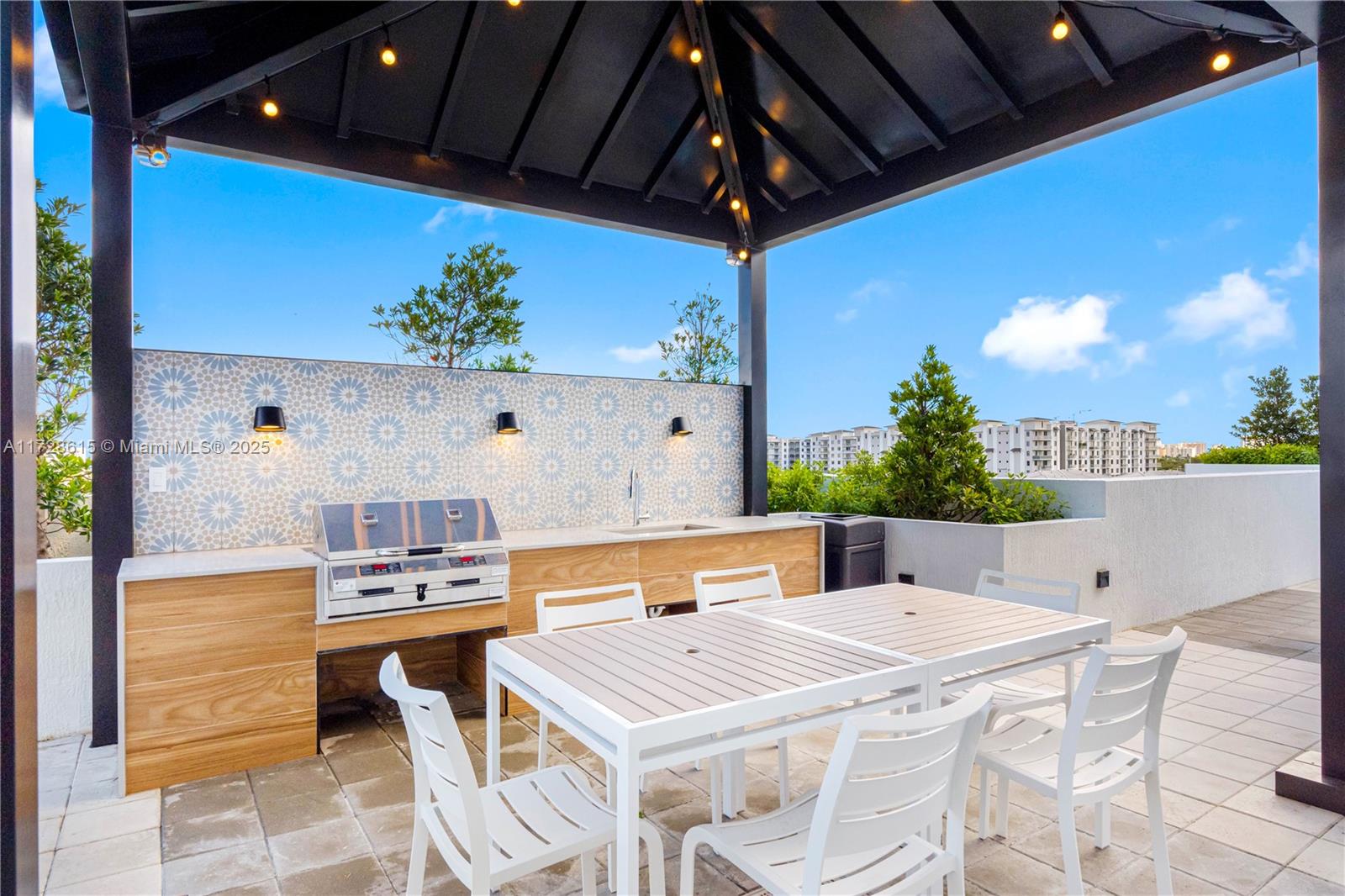 208 North Federal Highway, Unit 309 Pompano Beach, FL 33062 - Photo 9 of 29 a view of an outdoor space with seating area