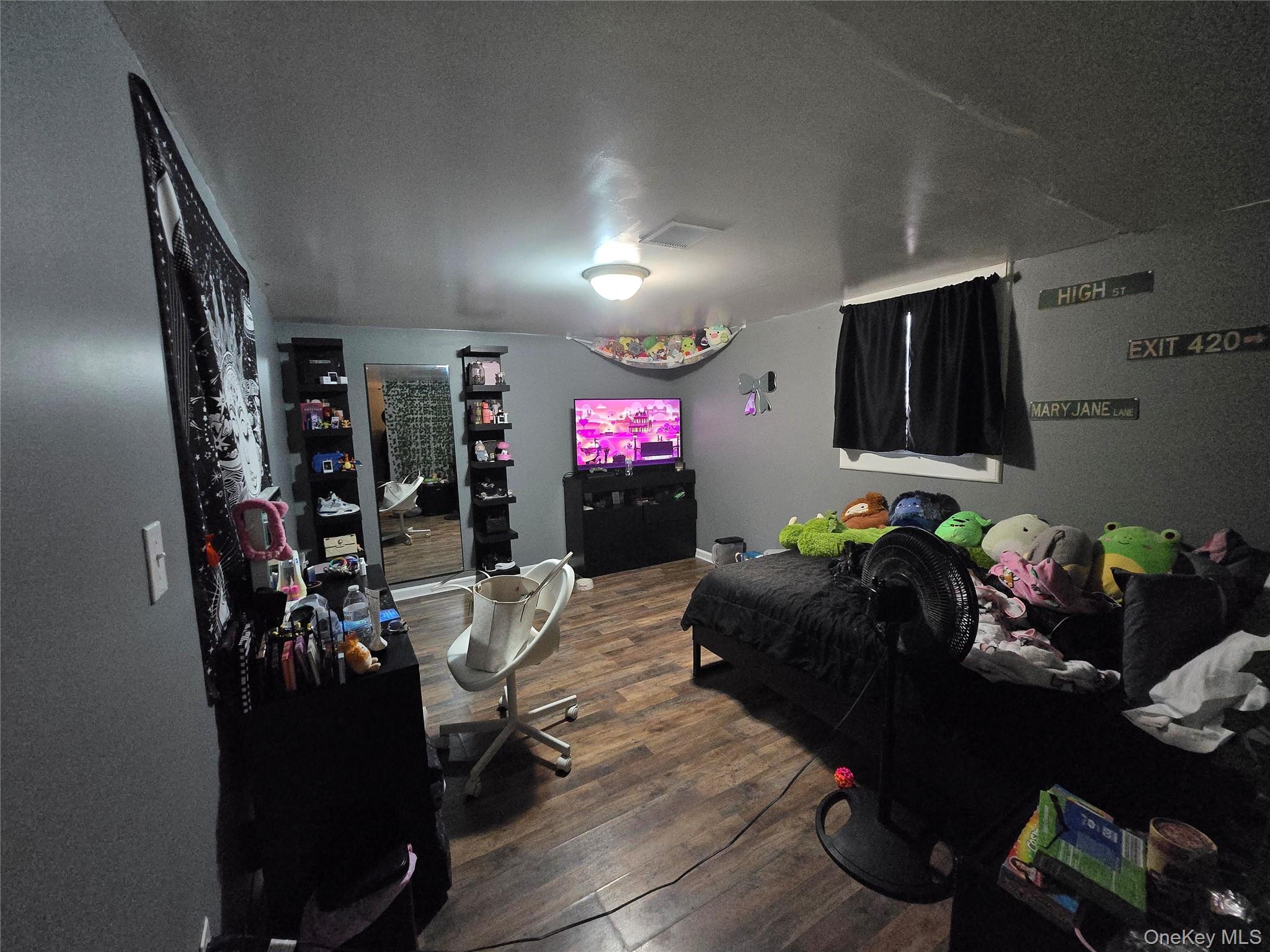 36 Houston Street Florida, NY 10921 - Photo 14 of 39 a living room with furniture and a flat screen tv