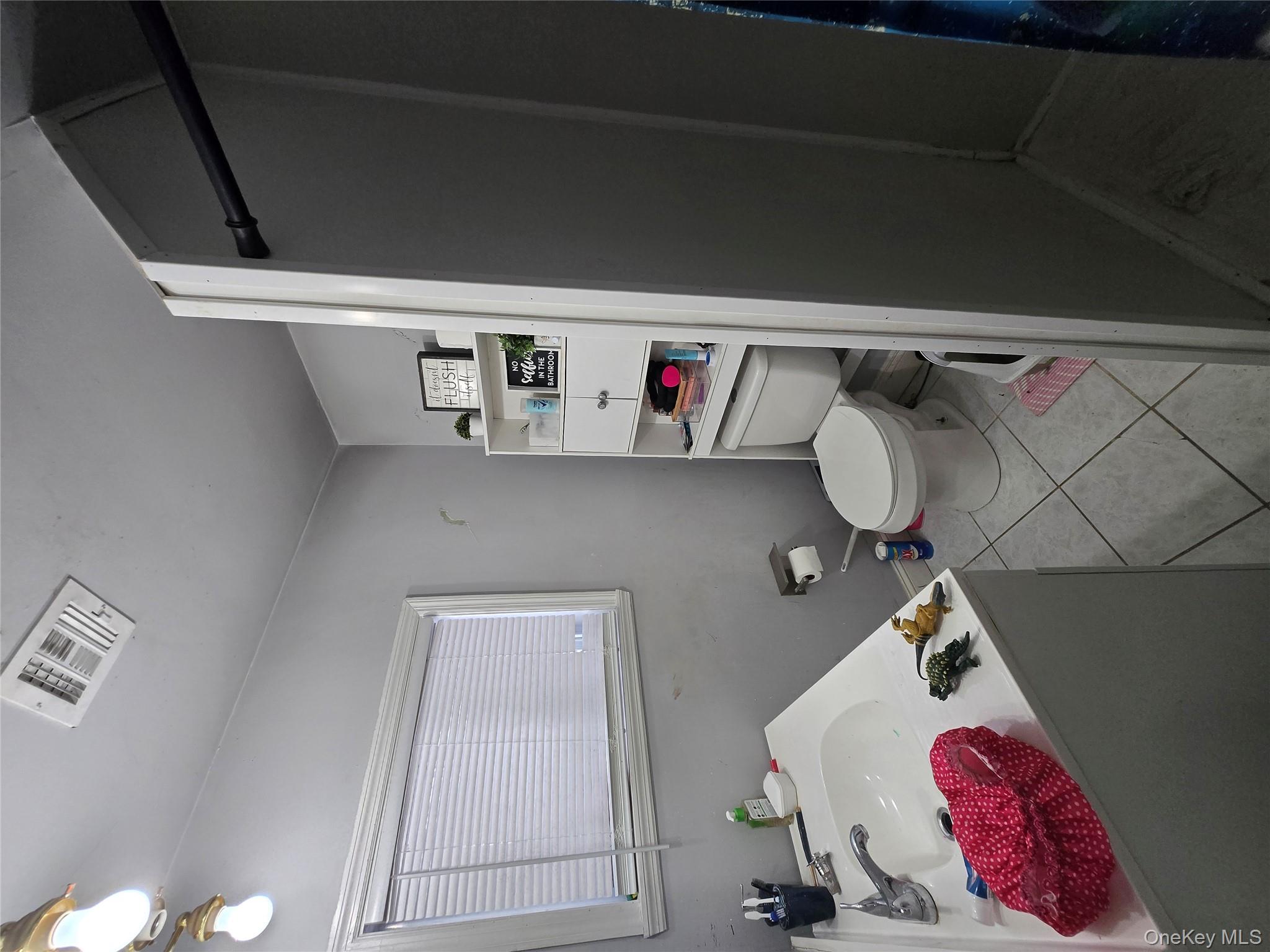 36 Houston Street Florida, NY 10921 - Photo 16 of 39 a bathroom with a sink toilet and a vanity