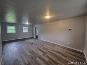 36 Houston Street Florida, NY 10921 - Photo 21 of 39 an empty room with wooden floor and windows