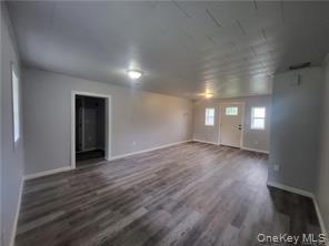 36 Houston Street Florida, NY 10921 - Photo 22 of 39 a view of empty room with window and wooden floor