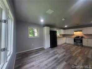 36 Houston Street Florida, NY 10921 - Photo 24 of 39 a view of a kitchen with a sink and a refrigerator