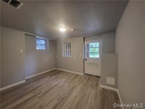 36 Houston Street Florida, NY 10921 - Photo 30 of 39 an empty room with wooden floor and windows