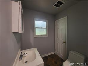36 Houston Street Florida, NY 10921 - Photo 34 of 39 a bathroom with a sink and toilet