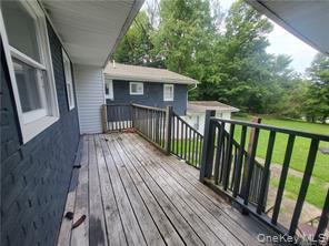 36 Houston Street Florida, NY 10921 - Photo 36 of 39 a view of backyard with deck and wooden floor