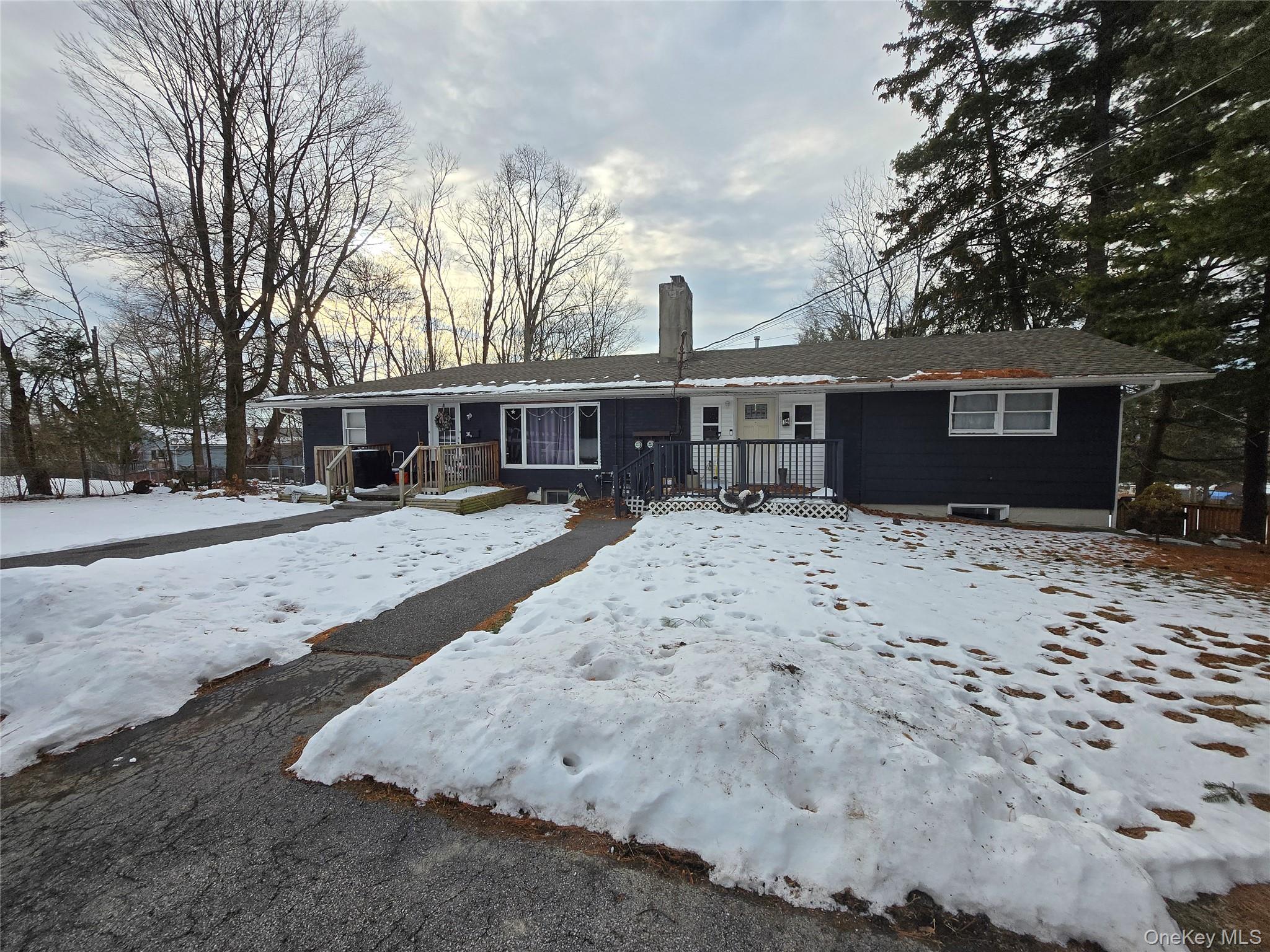 36 Houston Street Florida, NY 10921 - Photo 39 of 39 a view of a house with a yard covered in snow