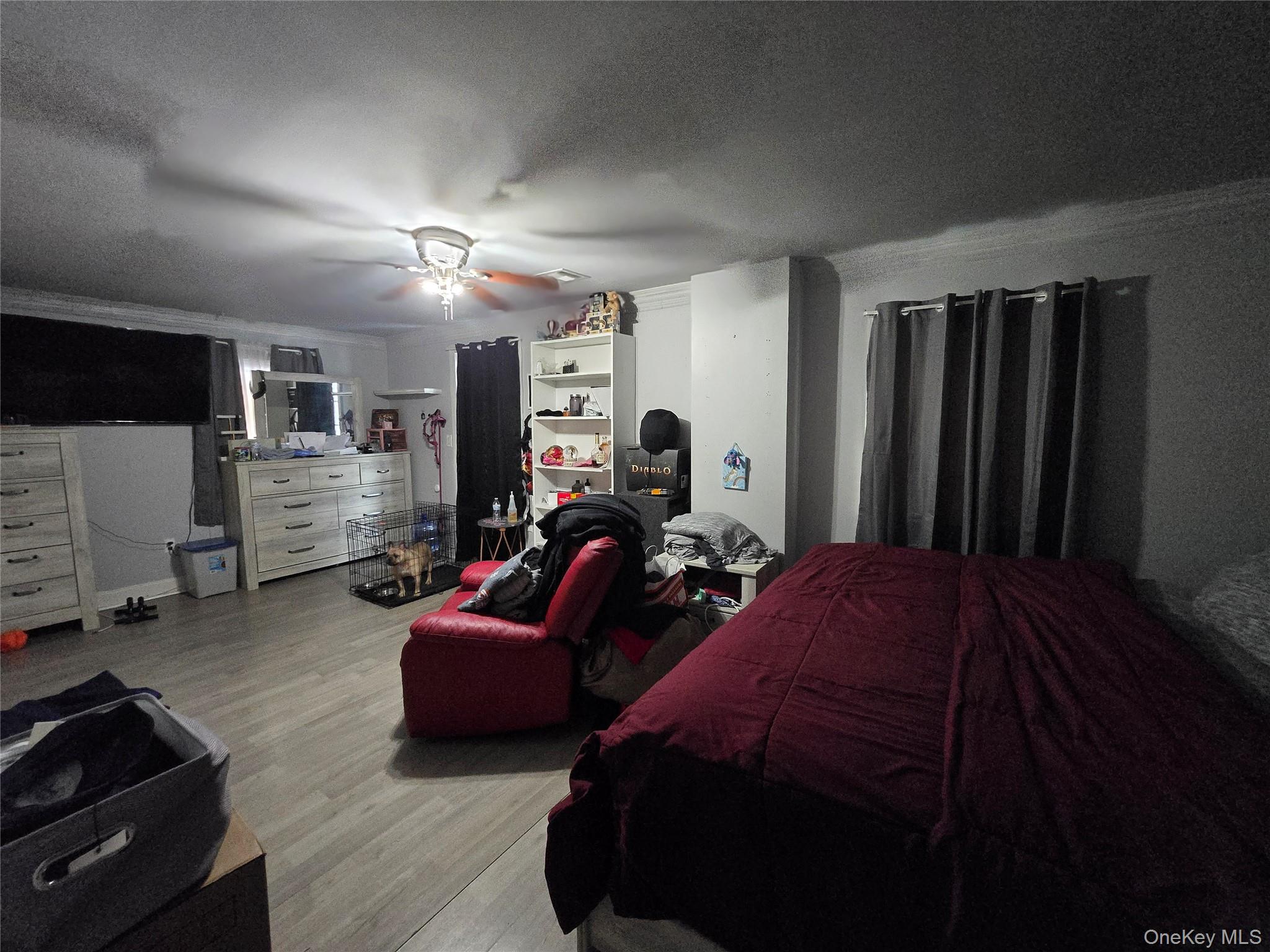 36 Houston Street Florida, NY 10921 - Photo 9 of 39 a bedroom with bed and a tv