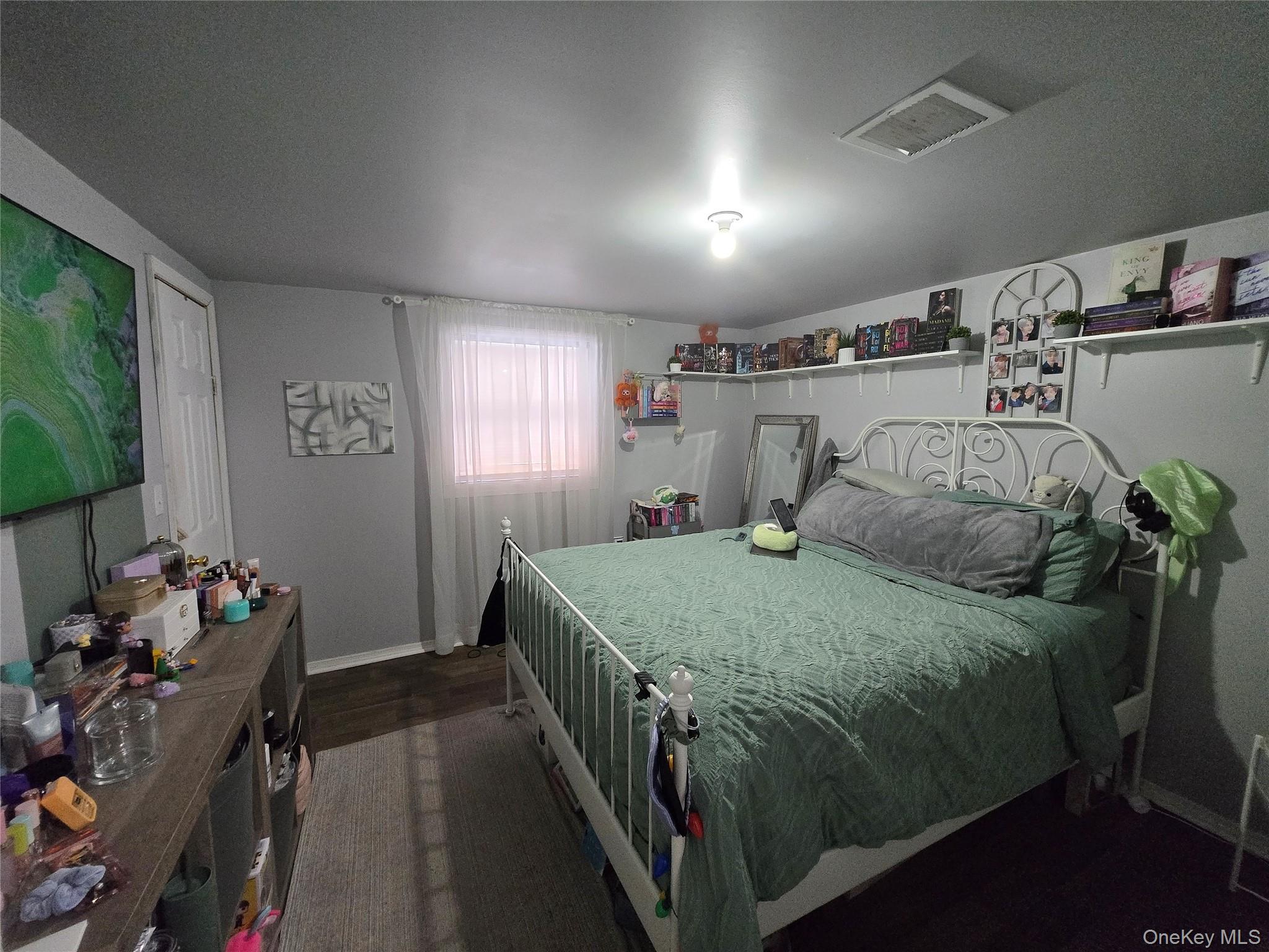 36 Houston Street Florida, NY 10921 - Photo 10 of 39 a bed sitting in a bedroom next to a window