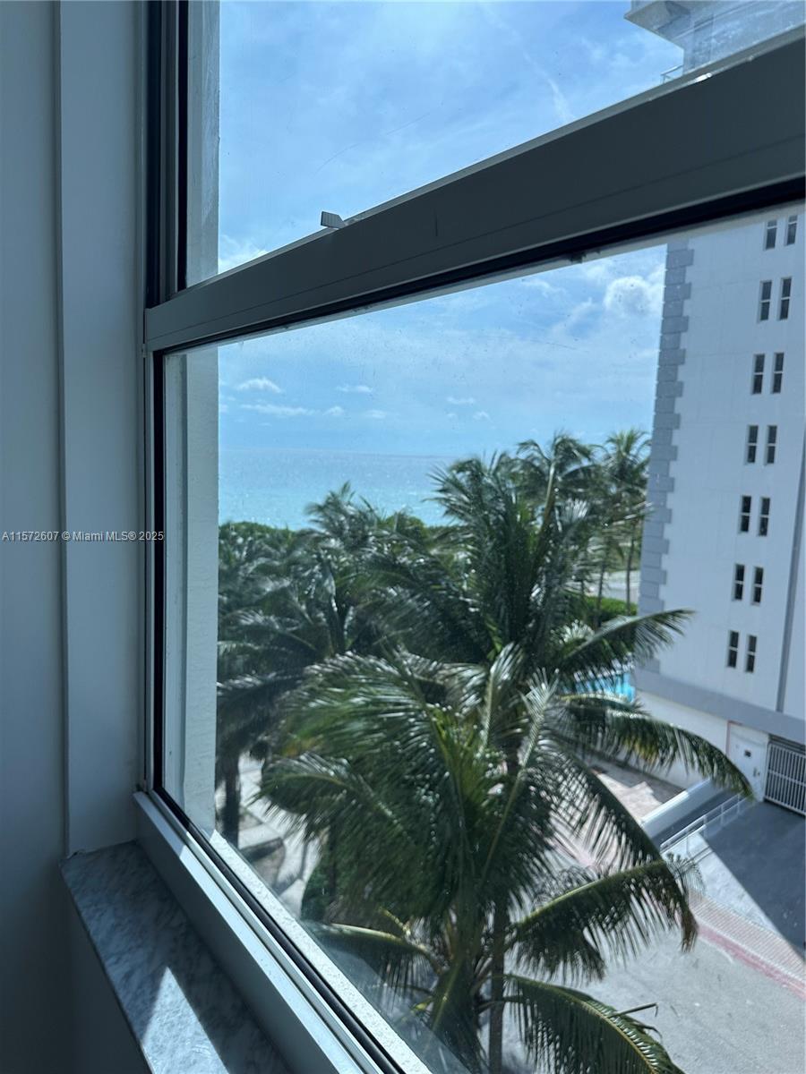 9201 Collins Avenue, Unit 524 Surfside, FL 33154 - Photo 15 of 20 a view of backyard from window