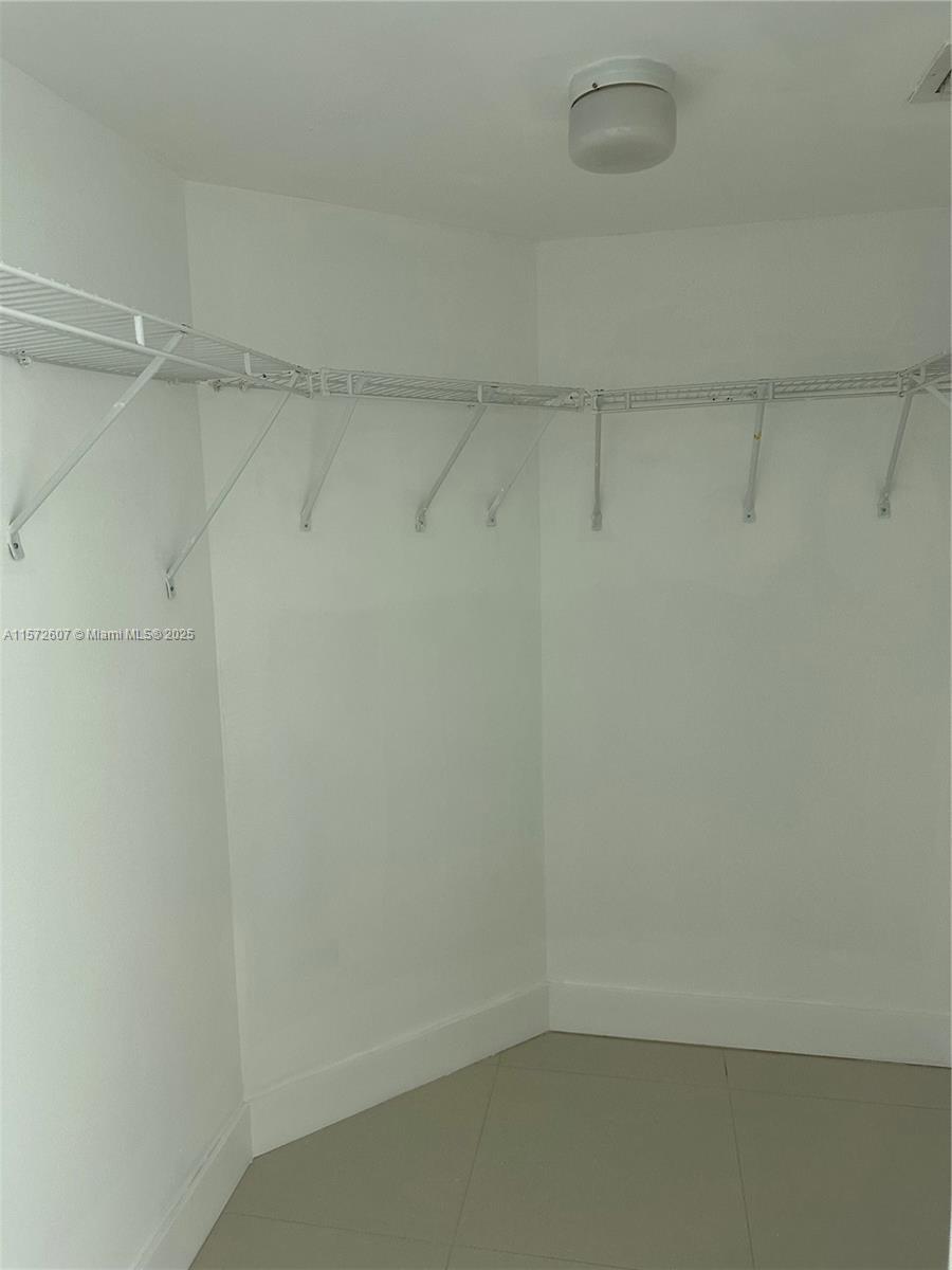 9201 Collins Avenue, Unit 524 Surfside, FL 33154 - Photo 17 of 20 a small space with a shower