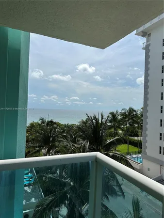 a view of a lake from a balcony