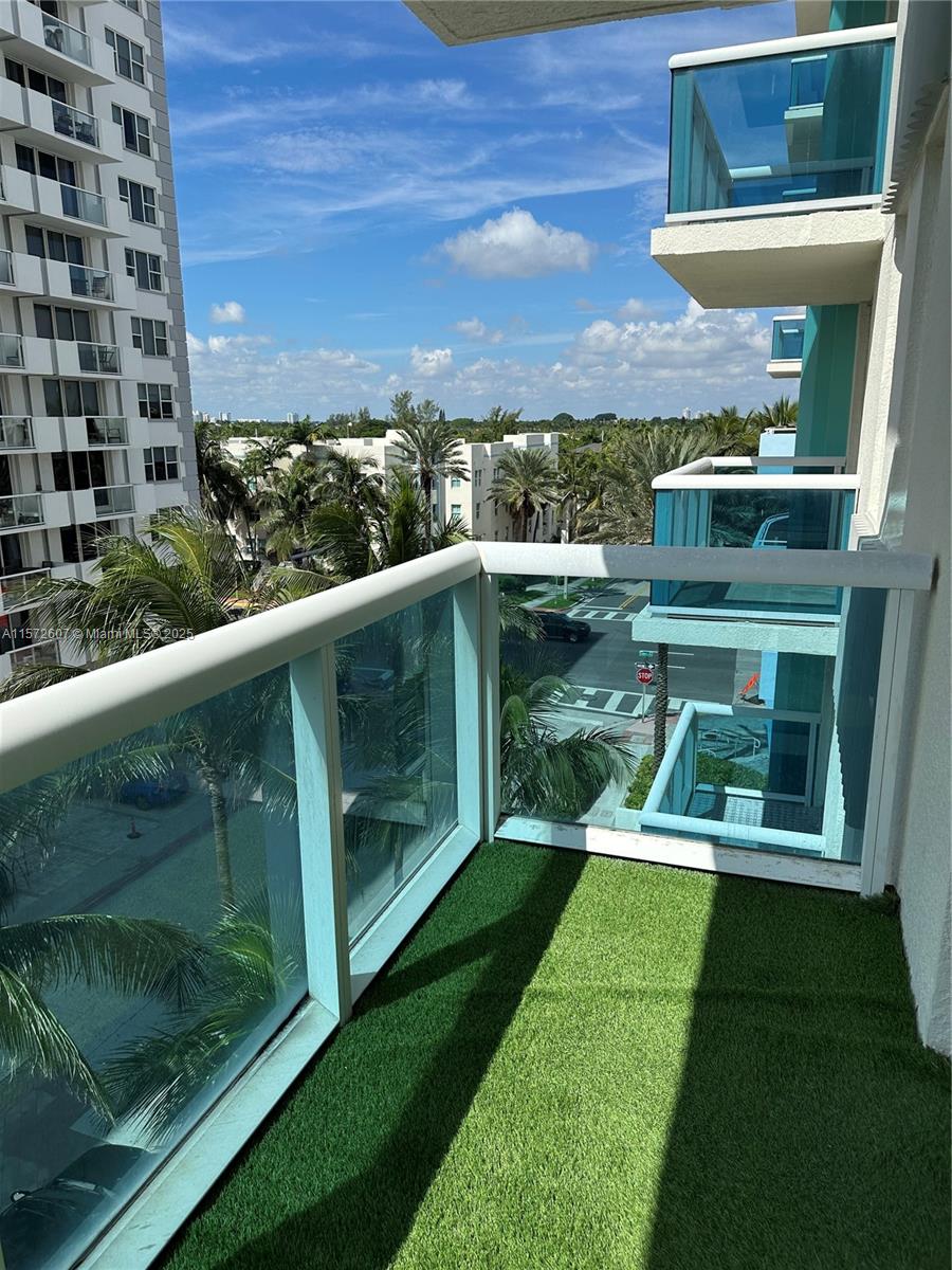 9201 Collins Avenue, Unit 524 Surfside, FL 33154 - Photo 4 of 20 a view of a balcony with an outdoor space
