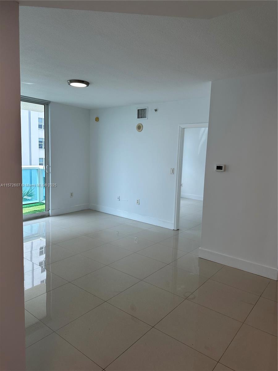 9201 Collins Avenue, Unit 524 Surfside, FL 33154 - Photo 5 of 20 a view of an empty room