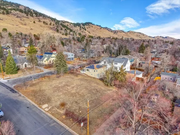 a view of a backyard of a house