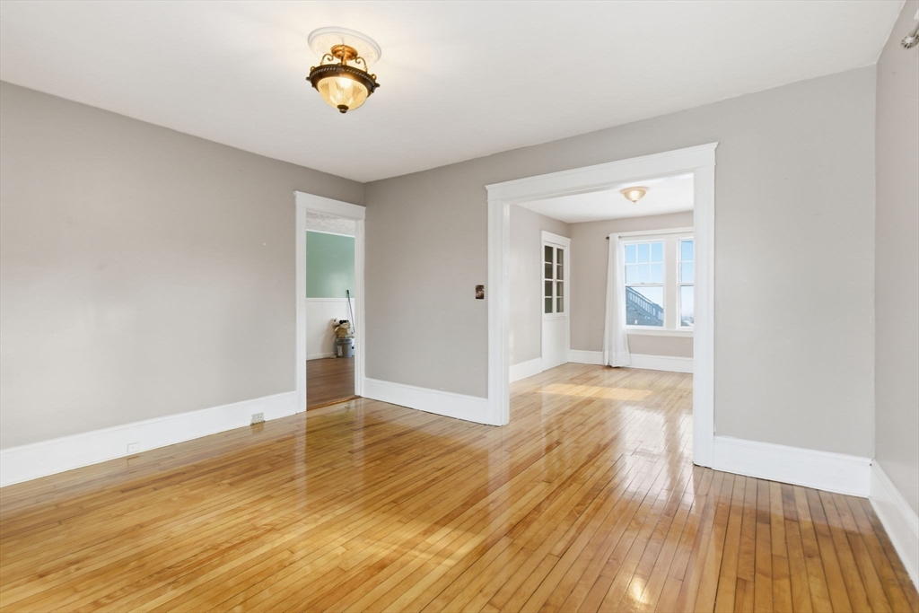 143 Commonwealth Avenue Worcester, MA 01604 - Photo 11 of 35 a view of a room with wooden floor