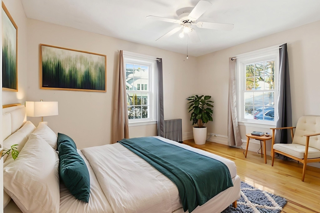 143 Commonwealth Avenue Worcester, MA 01604 - Photo 15 of 35 a bedroom with a large bed and a window